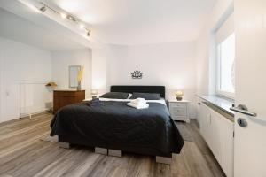 Postel nebo postele na pokoji v ubytování Ferienwohnung My Suite Home
