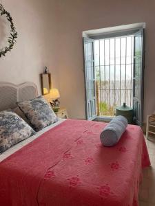 Postel nebo postele na pokoji v ubytování AntiQua centro de Vejer con wifi Grupo AC Gestion