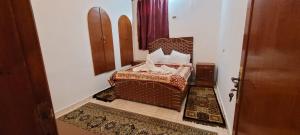 Postel nebo postele na pokoji v ubytování Luxor Villa Hatshepsut
