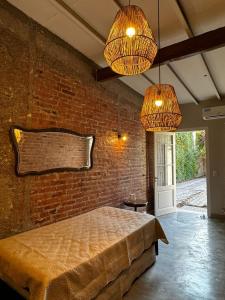 Ένα ή περισσότερα κρεβάτια σε δωμάτιο στο Casa Jazmin