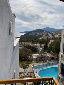 a view of a swimming pool from a building at Sevgi Hotel Kalkan in Kalkan