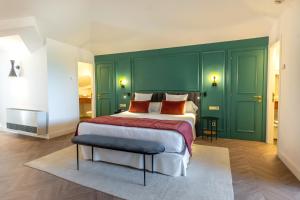 Postel nebo postele na pokoji v ubytování Hotel TorreMirona Golf & Spa