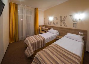 Postel nebo postele na pokoji v ubytování Raziotel Kyiv (Boryspilska)