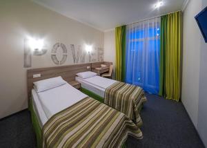 Postel nebo postele na pokoji v ubytování Raziotel Kyiv (Boryspilska)