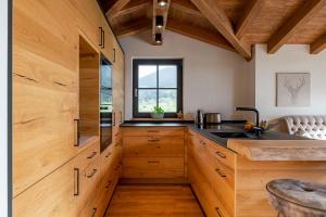 Kuchyň nebo kuchyňský kout v ubytování Chalet Edelweiss