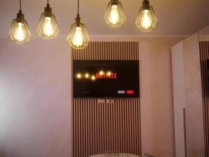 TV a/nebo společenská místnost v ubytování Our Guest House