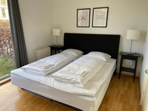Postel nebo postele na pokoji v ubytování South Harbour Apartments