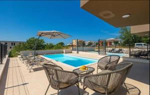 Swimmingpoolen hos eller tæt på Villa Esmeralda II by SeeAdria Agency