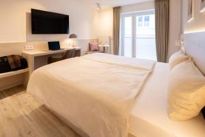 Voodi või voodid majutusasutuse Hotel Stranddistel toas