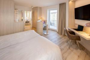 Voodi või voodid majutusasutuse Hotel Stranddistel toas