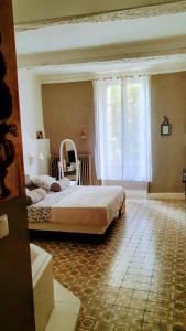 Postel nebo postele na pokoji v ubytování Le 4 Feuilles en.Camargue