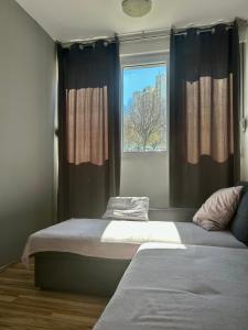 מיטה או מיטות בחדר ב-Apartman Split