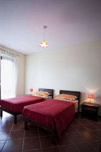Un pat sau paturi într-o cameră la Borgo Nicoletta Case per le vacanze