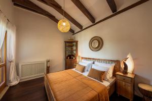 Postel nebo postele na pokoji v ubytování Villa Barotul + 37 fotografií