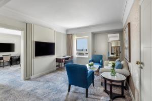 a living room with a couch and a table at Intercontinental Cairo Citystars by IHG in Cairo
