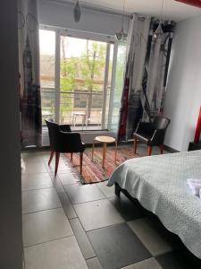 Postel nebo postele na pokoji v ubytování Mezzanine
