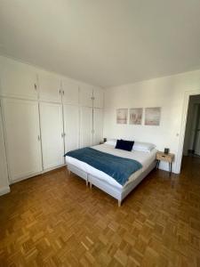 Posteľ alebo postele v izbe v ubytovaní magnifique appartement + 4 fotografie