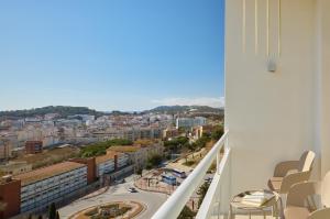 a view of a city from a balcony at Meliá Lloret de Mar in Lloret de Mar