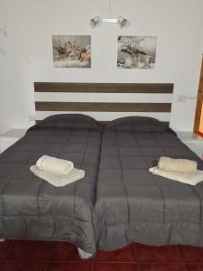 Postel nebo postele na pokoji v ubytování Casa Lourdes