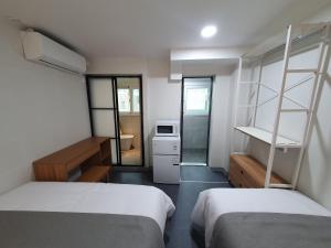 Beyond Residence Jongnoにあるベッド