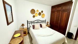 Postel nebo postele na pokoji v ubytování Bohemio Playa Los Cristianos By Deihu Experiecias + 22 fotografií