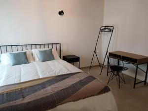 Postel nebo postele na pokoji v ubytování PEACE ROOMS