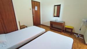 Voodi või voodid majutusasutuse Residencial Amarante toas