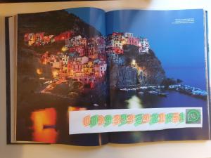 a book with a picture of a city at Vacation Home Tuscany Pisa-Lucca 2 in Filettole