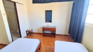 Voodi või voodid majutusasutuse Residencial Amarante toas