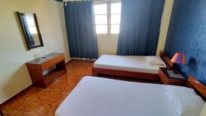 Voodi või voodid majutusasutuse Residencial Amarante toas