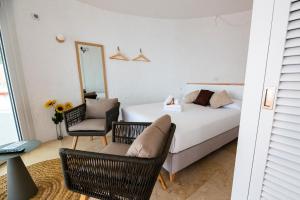 A bed or beds in a room at Agi Castell Mar Még 37 kép