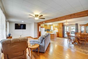 a living room with a couch and a table at Pet-Friendly Onia Vacation Rental with Private Deck! in Onia