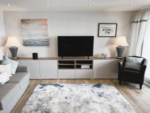 TV a/nebo společenská místnost v ubytování 25 Breakwaters - Pet friendly