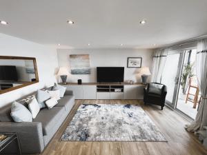 TV a/nebo společenská místnost v ubytování 25 Breakwaters - Pet friendly