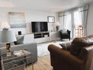 TV a/nebo společenská místnost v ubytování 25 Breakwaters - Pet friendly