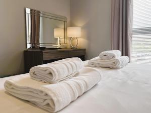Postel nebo postele na pokoji v ubytování 25 Breakwaters - Pet friendly