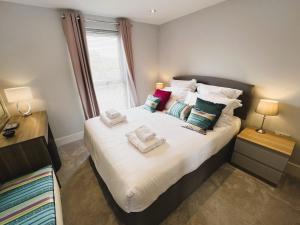 Postel nebo postele na pokoji v ubytování 25 Breakwaters - Pet friendly