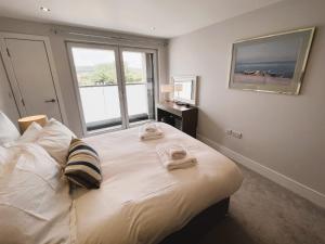Postel nebo postele na pokoji v ubytování 25 Breakwaters - Pet friendly