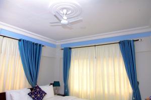 Una cama o camas en una habitación de Vovole Luxury Homes