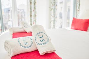 Ένα ή περισσότερα κρεβάτια σε δωμάτιο στο Santa Cruz Alicante Apartamentos