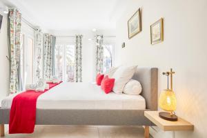 Postel nebo postele na pokoji v ubytování Santa Cruz Alicante Apartamentos