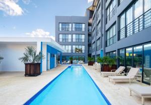 Bazén v ubytování Instyle Residences at RIZZ SUITES nebo v jeho okolí