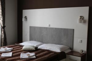 Postel nebo postele na pokoji v ubytování Apartments Verona Karlovy Vary