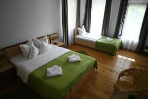 Postel nebo postele na pokoji v ubytování Egreta By Hoxton