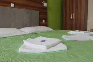 Postel nebo postele na pokoji v ubytování Apartments Verona Karlovy Vary