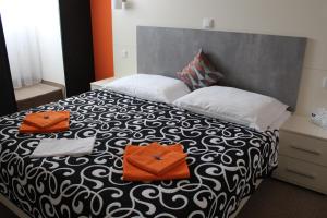 Postel nebo postele na pokoji v ubytování Apartments Verona Karlovy Vary