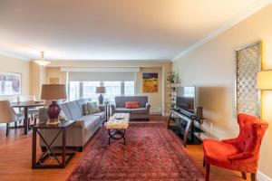 a living room with a couch and a table at Lovely Waterfront Apt #807 with AC in Halifax