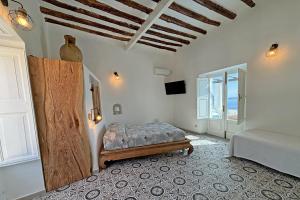 Postel nebo postele na pokoji v ubytování Casa Acquamarina