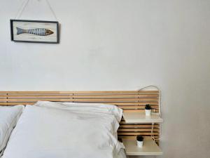 Postel nebo postele na pokoji v ubytování ca' di mezzo