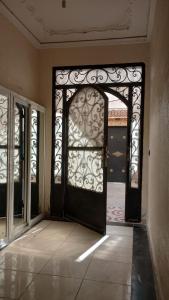 an entrance to a room with an open door at Apartment 20m from Martil beach in Tétouan